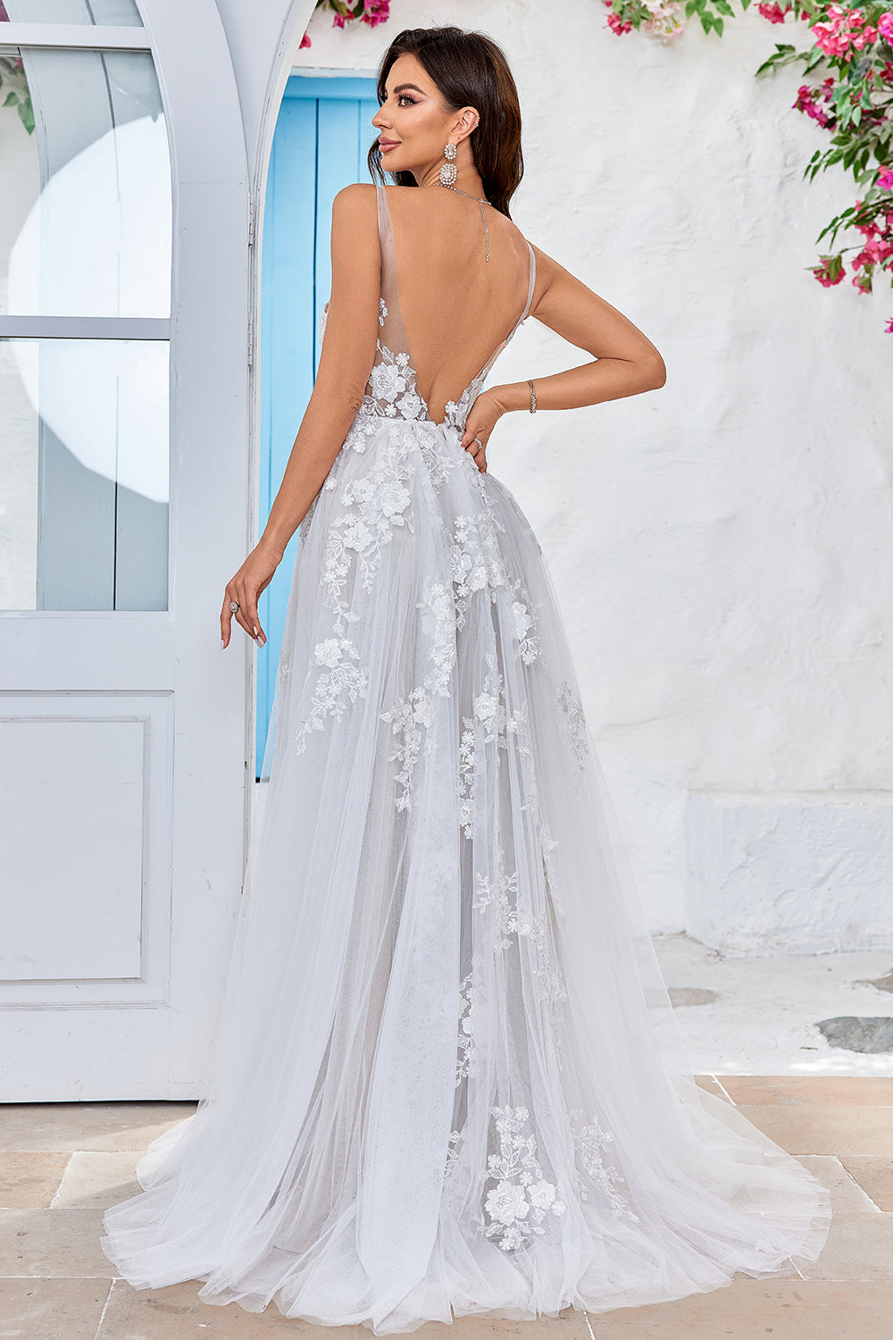 Robe de mariée longue en tulle dos nu ivoire avec Broderie