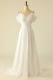 Robe de mariée en tulle blanc sur l’épaule