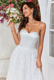 Robe de mariée trapèze en dentelle corset longueur thé chérie