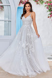 Robe de mariée longue en tulle dos nu ivoire avec Broderie