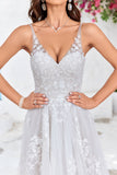 Robe de mariée longue en tulle dos nu ivoire avec Broderie