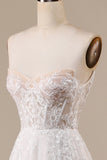 Robe de mariée A-ligne ivoire à épaules dénudées avec appliques