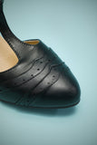 Talons pointus en cuir noir