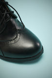Talons Chunky en cuir noir