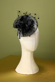 Bandeau perlé de plume noire des années 20