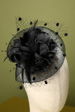 Bandeau perlé de plume noire des années 20