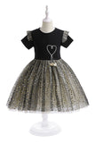Robe de fille en tulle noir avec des étoiles