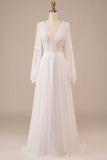 Robe de mariée ivoire à manches longues avec dentelle
