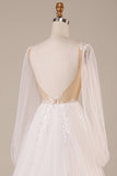 Manches longues Dos ouvert Robe de mariée ivoire avec appliques