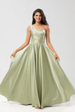 Robe de demoiselle d’honneur vert satin à une épaule avec poches