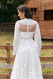 Robe de mariée bohème à manches longues ivoire avec dentelle