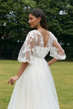 Robe de mariée corset à manches bouffantes ivoire avec des fleurs 3D