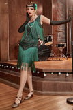 Robe vert foncé Gatsby des années 1920 avec paillettes et franges
