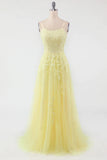 Robe de bal à bretelles spaghetti jaunes avec appliques