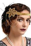 Bandeau perlé de plumes noires et dorées des années 20
