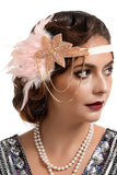 Bandeau perlé de plumes noires et dorées des années 20