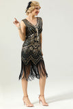 Robe à paillettes noires et dorées des années 20