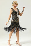 Robe à paillettes noires et dorées des années 20