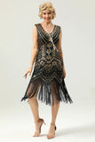 Robe à paillettes noires et dorées des années 20