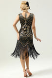 Robe à paillettes noires et dorées des années 20