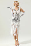 Robe à paillettes noires et dorées des années 20