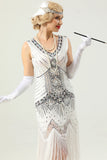 Robe à paillettes noires et dorées des années 20