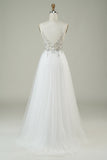Magnifique robe de mariée longue ligne A à bretelles spaghetti en tulle blanc avec perles