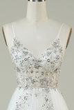 Magnifique robe de mariée longue ligne A à bretelles spaghetti en tulle blanc avec perles